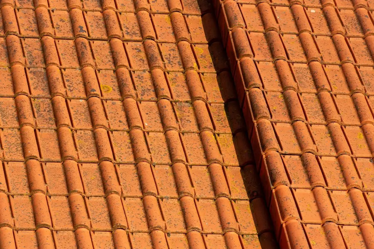 Orange terracotta roof tiles in rows
